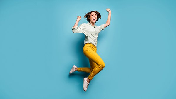 Glückliche Frau dank funktionierender IT.